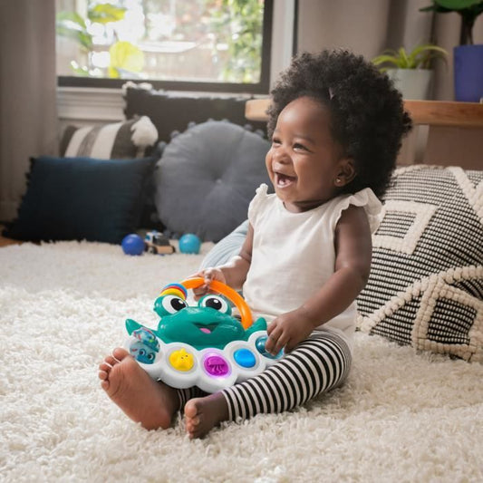 BABY EINSTEIN Ocean Explorers Neptune's Busy Bubbles sensory activity toy, interactive lights and music, 3 months