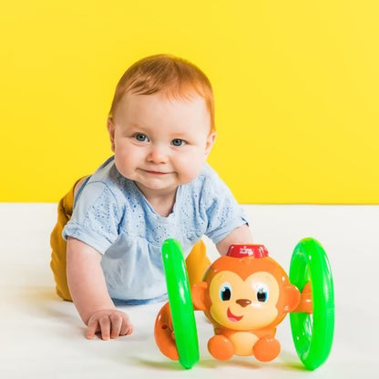 BRIGHT STARTS Petit singe Roll & Glow