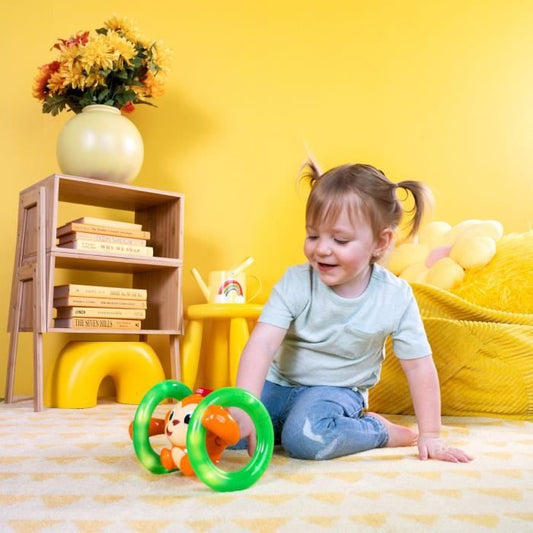 BRIGHT STARTS Petit singe Roll & Glow