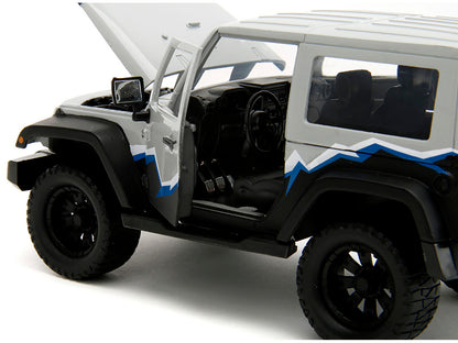2007 Jeep Wrangler Gray and Black with Blue and White Stripes with Extra Wheels "Just Trucks" Series 1/24 Diecast Model Car by Jada