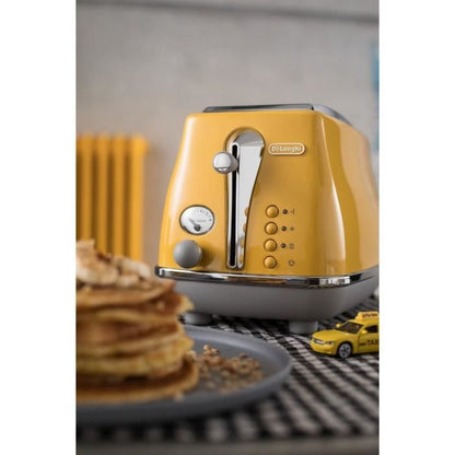 DELONGHI ICONA CAPITALS Toaster 2 slices - 900W - 3 function toaster - Pastry warmer included - Yellow