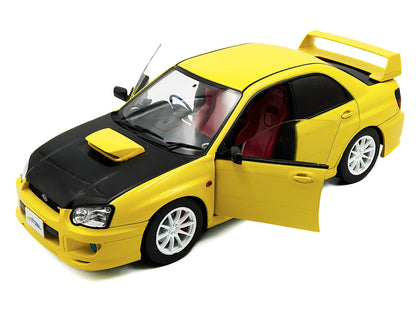 2003 Subaru Impreza WRX STI RHD (Right Hand Drive) Yellow with Carbon Hood 1/18 Diecast Model Car by Solido